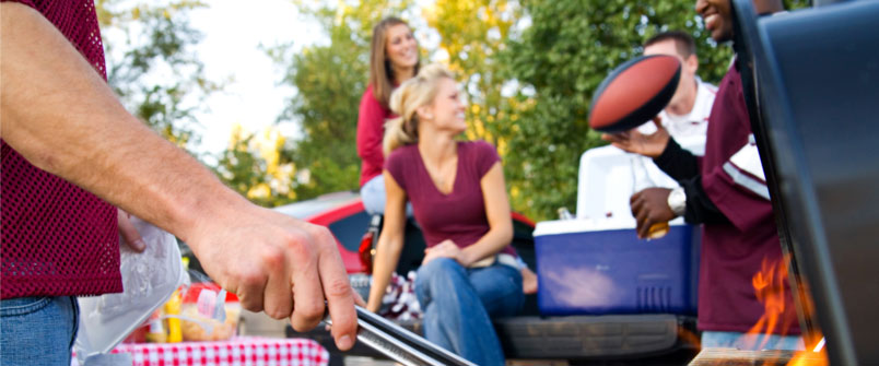 People at a tailgate party