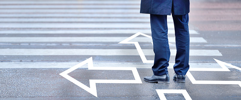 Person standing in a crosswalk