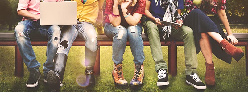 Students sitting on a bench